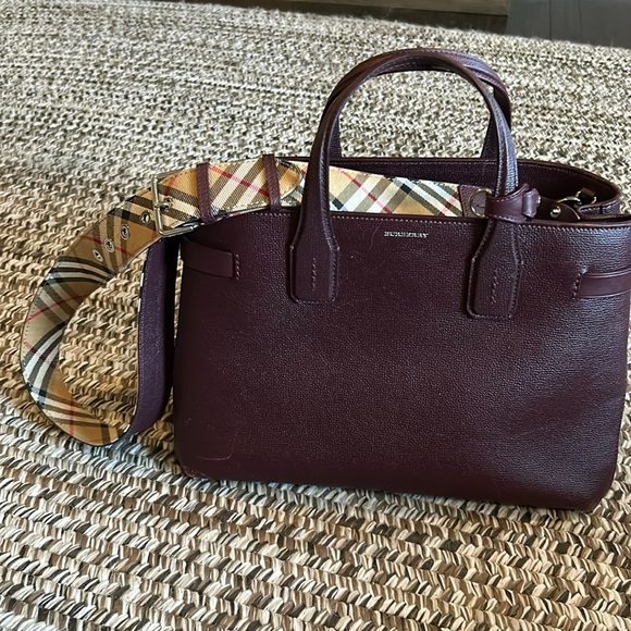 Burberry Handbags - Burberry Burgundy pebble leather w reserve nova check /solid crossbody strap